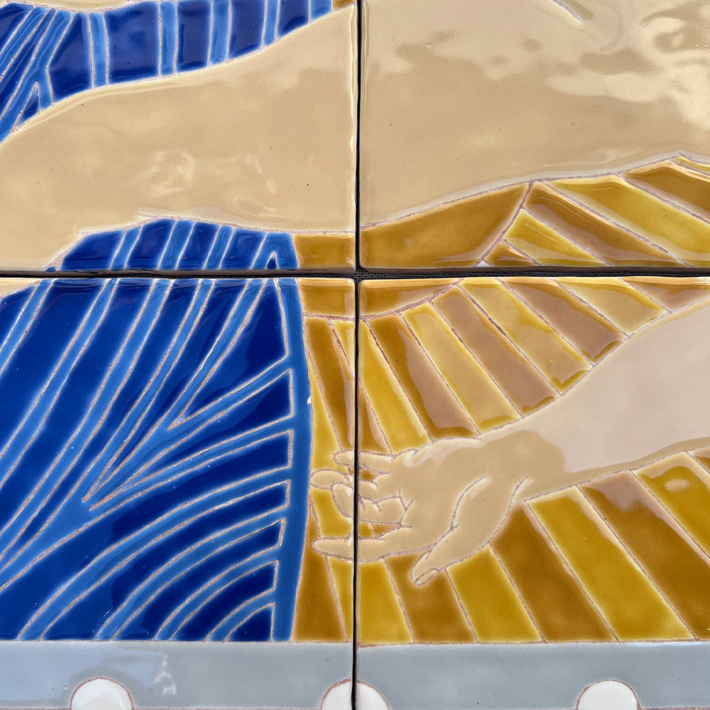 A Man's Universe: Statement Hand-Painted Tile Mural